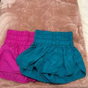 Free people way home shorts; both shorts- size small, pink and blue